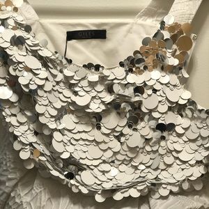 Pics do not do this justice. This is a stunning classic dress.  Giles brand